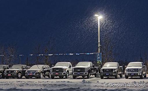 Car Lot In Snowfall_06948-51.jpg - Photographed at first light in Smiths Falls, Ontario, Canada.